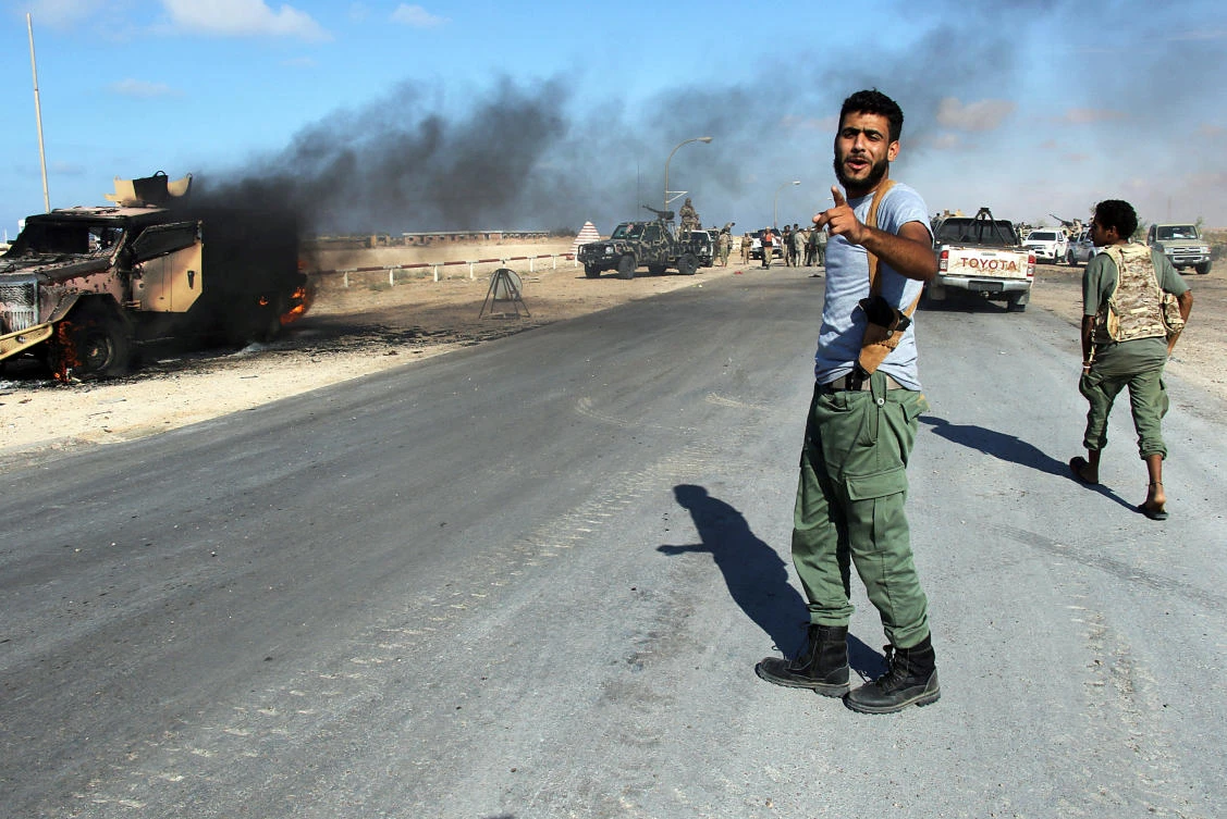 Members of the Libyan National Army next to Sidra oil port in Ras Lanuf last week. (Reuters)