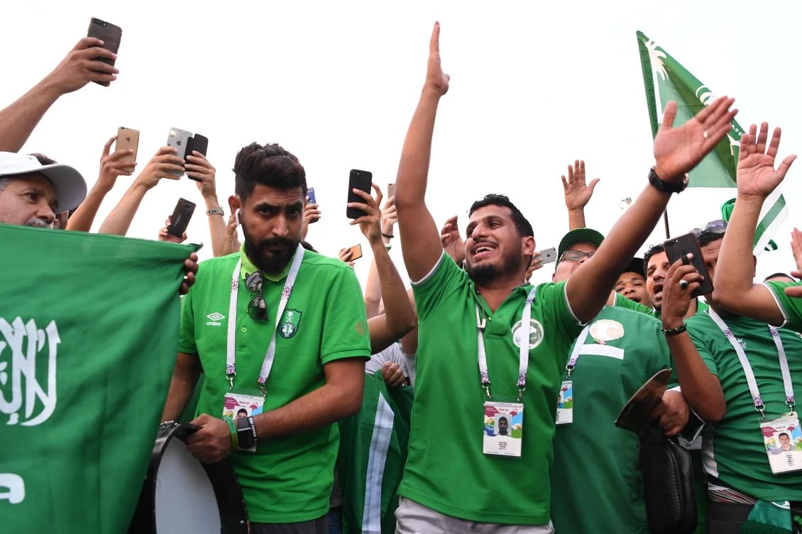 Saudi Arabia fans celebrate the team's win in the Russia 2018 World Cup Group A football match between Saudi Arabia and Egypt. (AFP/PHILIPPE DESMAZES)