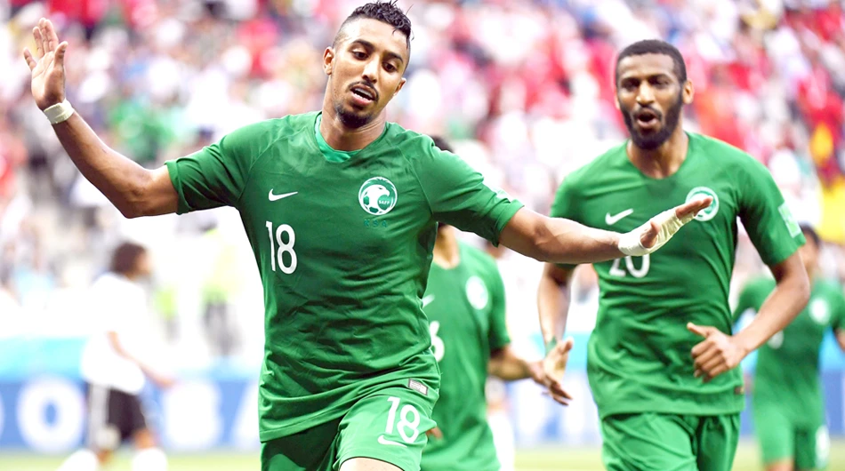 Saudi Arabia’s forward Salem Al-Dawsari celebrates scoring during the Russia 2018 World Cup Group A football match between Saudi Arabia and Egypt at the Volgograd Arena in Volgograd on Monday. (AFP )