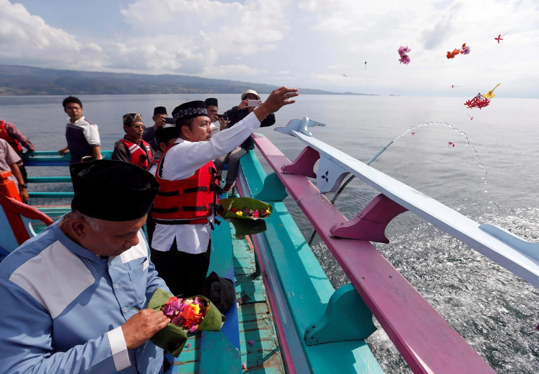Indonesia names captain, three officials as suspects in deadly ferry disaster