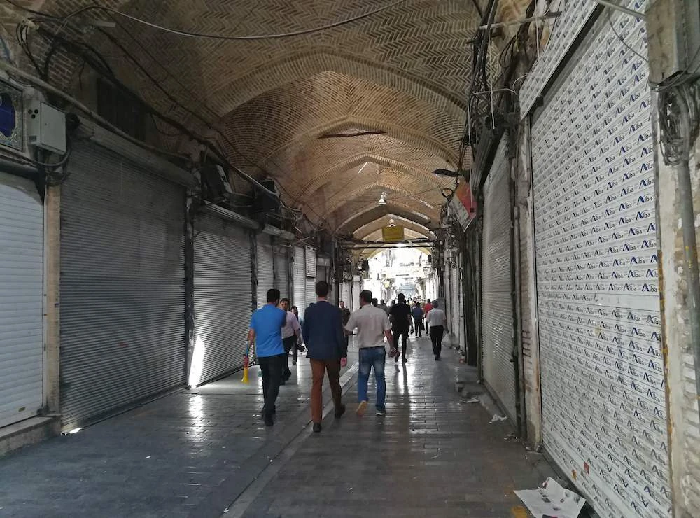 Shops in Tehran's Grand Bazaar shuttered on Monday as part of strikes and protests against economic hardship. (AFP)
