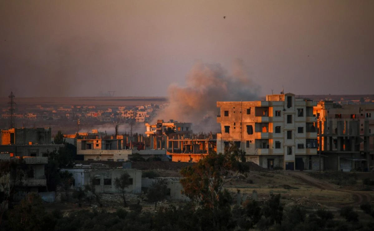Smoke rises above opposition held areas of Daraa during airstrikes by Syrian regime forces on June 26, 2018. Russian-backed regime forces have for weeks been preparing an offensive to retake Syria’s south, a strategic zone that borders both Jordan and the Israeli-occupied Golan Heights. (AFP)