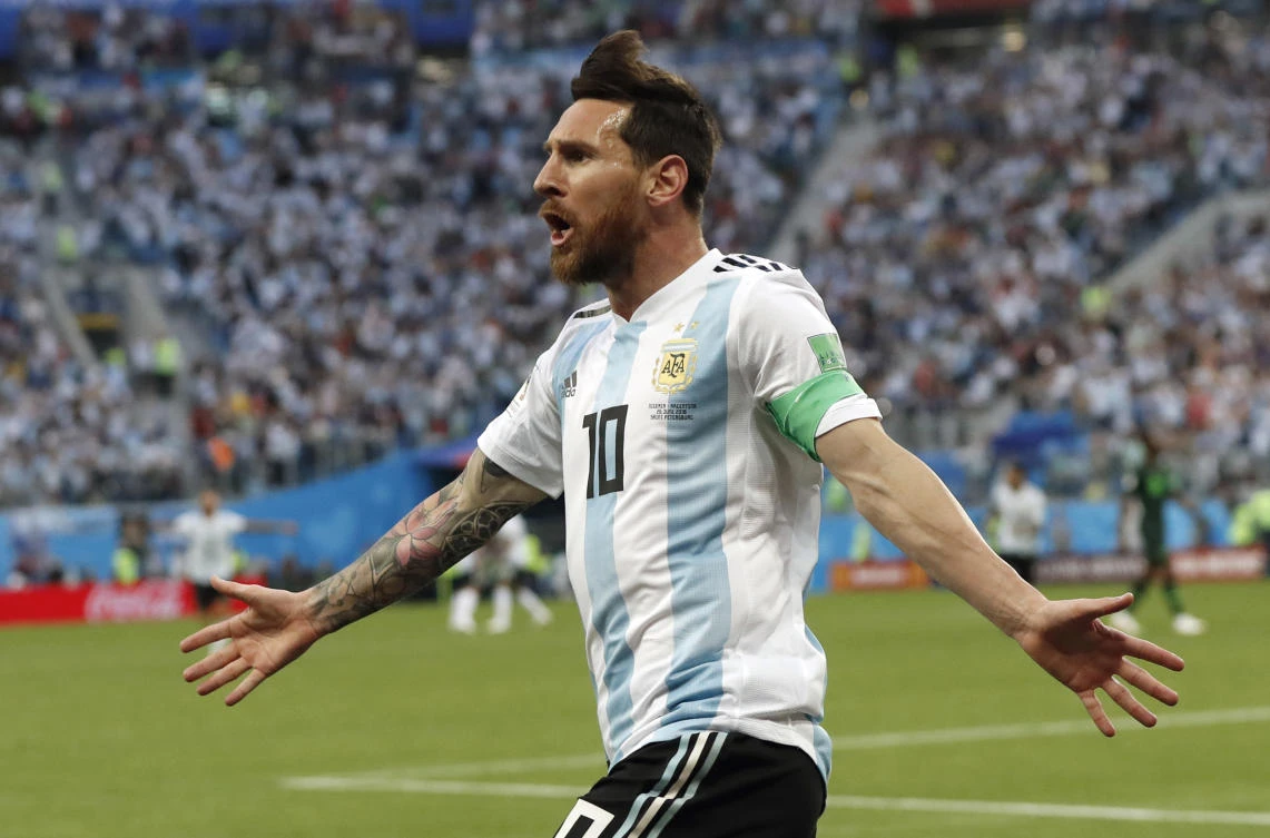 Argentina's Lionel Messi celebrates after scoring the opening goal of his team during the group D match between Argentina and Nigeria. (AP Photo/Petr David Josek)