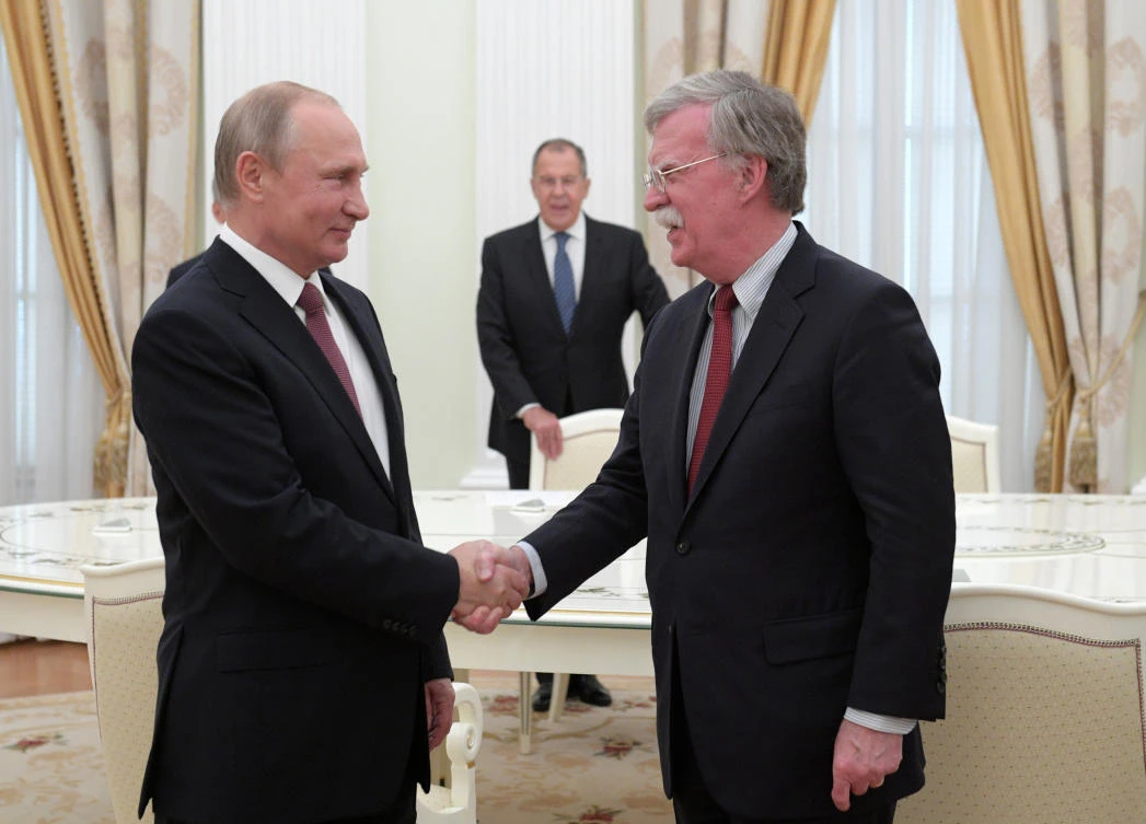 Russia’s President Vladimir Putin (L) meets with US National Security Adviser John Bolton in Moscow, Russia June 27, 2018. (Reuters)