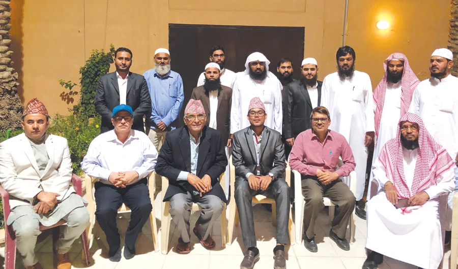 Nepal’s Ambassador Mahendra Prasad Singh Rajput, third from left, with diplomats and other guests in Riyadh. (AN photo)