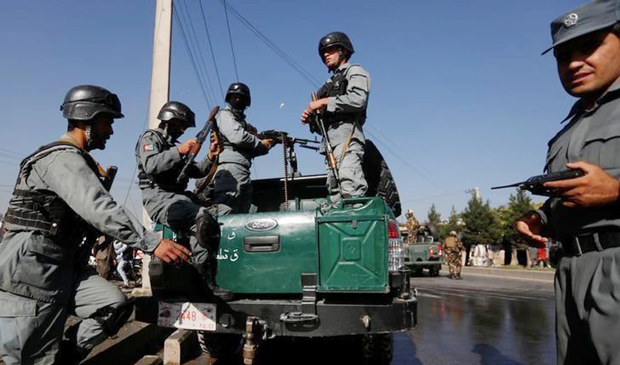 In this file photo, Afghan policemen arrive at the site of an attack in Kabul, Afghanistan. (REUTERS)