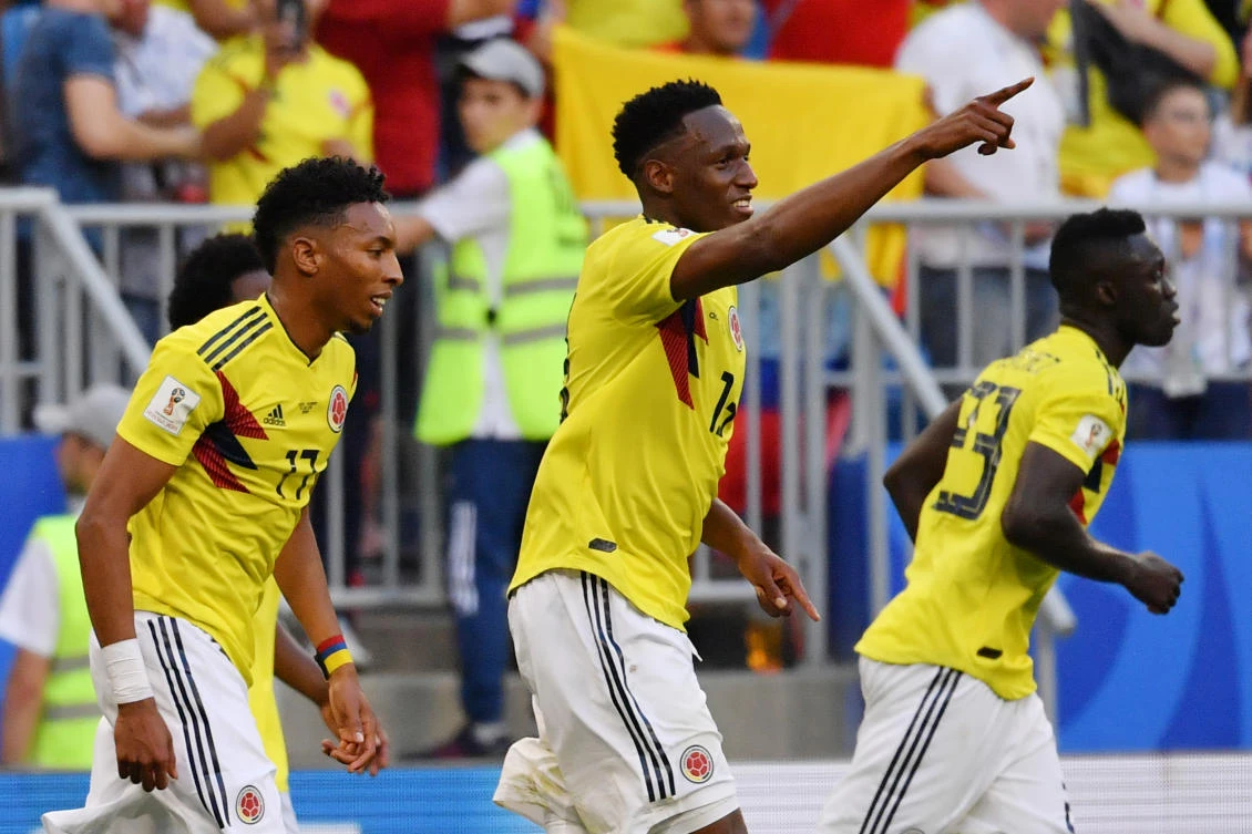 Mina winner sends Colombia through as ill-disciplined Senegal go out