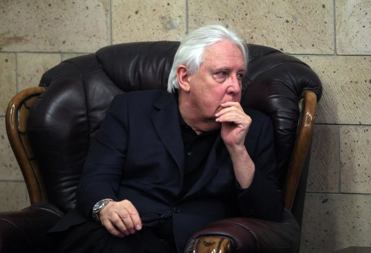 In this file photo, Martin Griffiths, the UN special envoy for Yemen, listens to Faisal Amin Abu-Rass (not pictured), the under-secretary of Houthi rebel government's foreign ministry, at Sanaa International Airport. (AFP)