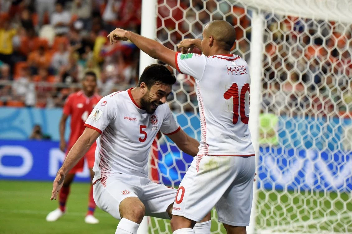 Wahbi Khazri is congratulated after scoring the winning goal against Panama. (AFP)