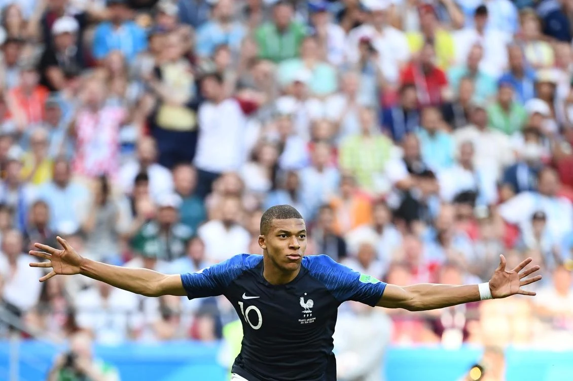 France's forward Kylian Mbappe celebrates after scoring their fourth goal during the Russia 2018 World Cup round of 16 football match between France and Argentina. (AFP/FRANCK FIFE)