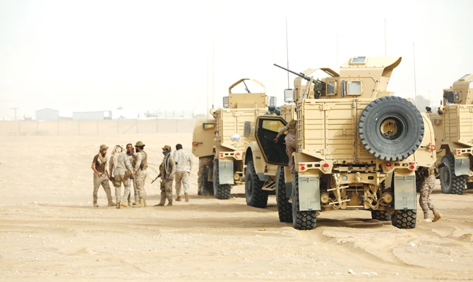 Saudi security forces keep watch along the border with Yemen in the Al-Khubah area in the southern Jazan province. (AFP/File)