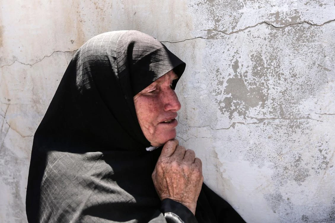 A Palestinian relative of 12 years old Yasser Abu Naja mourn over his death during the funeral in Khan Yunis, in the Southern Gaza Strip on June 30, 2018. A Palestinian youth was shot in the head near the town of Khan Yunis on June 29, according to health Ministry spokesman Ashraf Al-Qudra. (AFP)