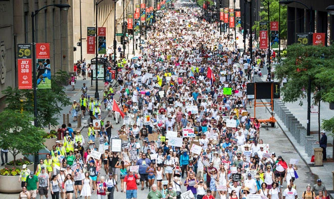 People participate in the Families Belong Together march in Chicago on Saturday, June 30, 2018. (AP)