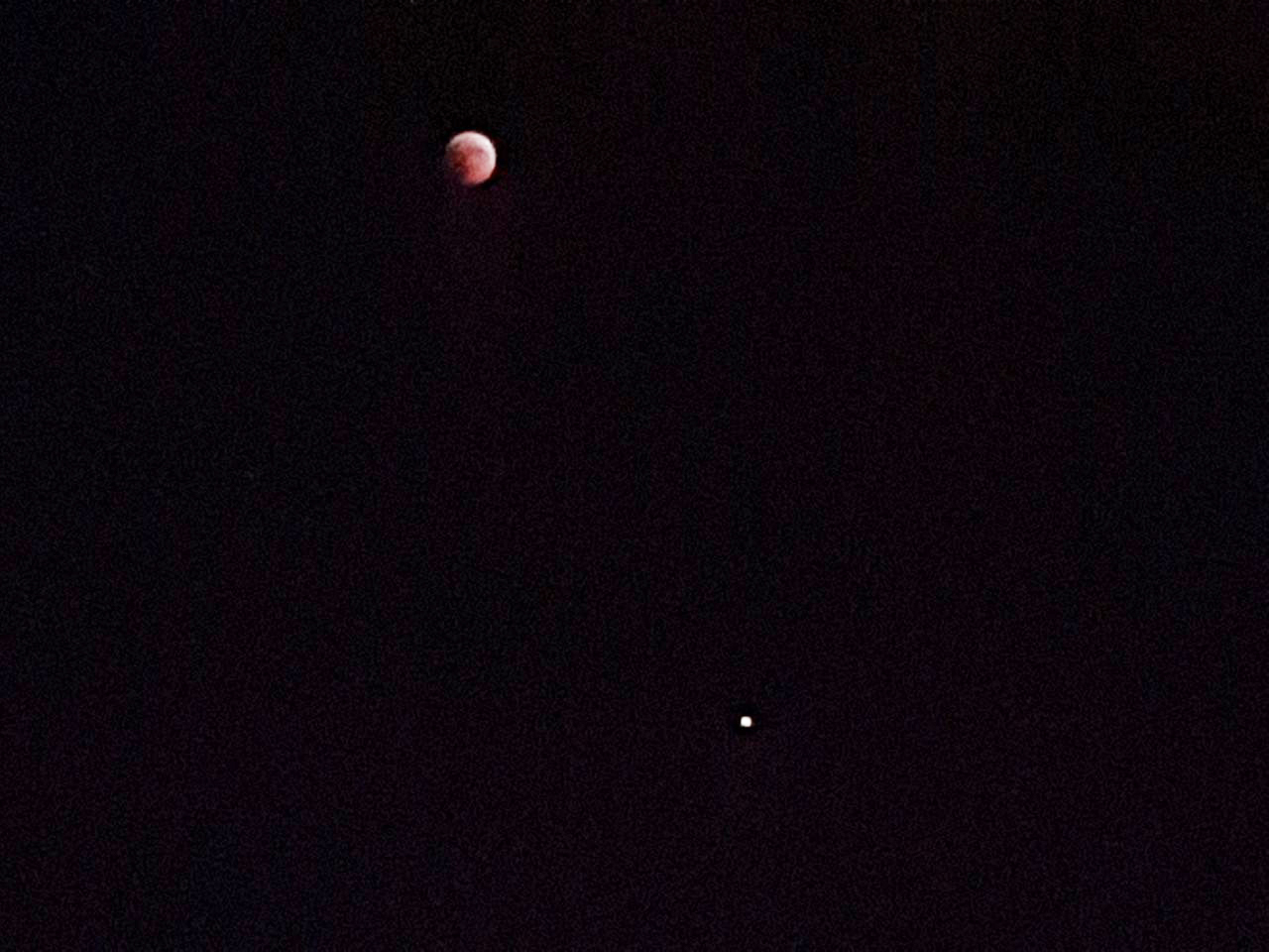 A view of the "Blood Moon", coinciding with Mars' closest approach in 15 years. (AN photo by Abdul Wasey Naik)