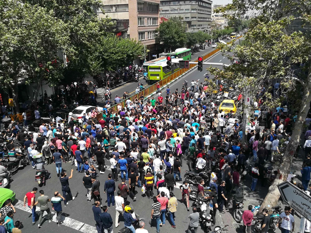 Iranian police open fire on protesters
