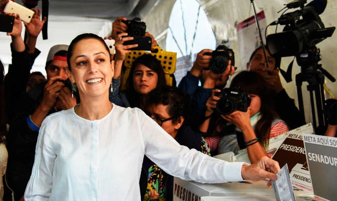 The candidate for governor for Mexico City Claudia Sheinbaum of the "Juntos haremos historia" coalition party, casts her vote during the general elections in Mexico City, on Sunday, July 1, 2018. (AFP)