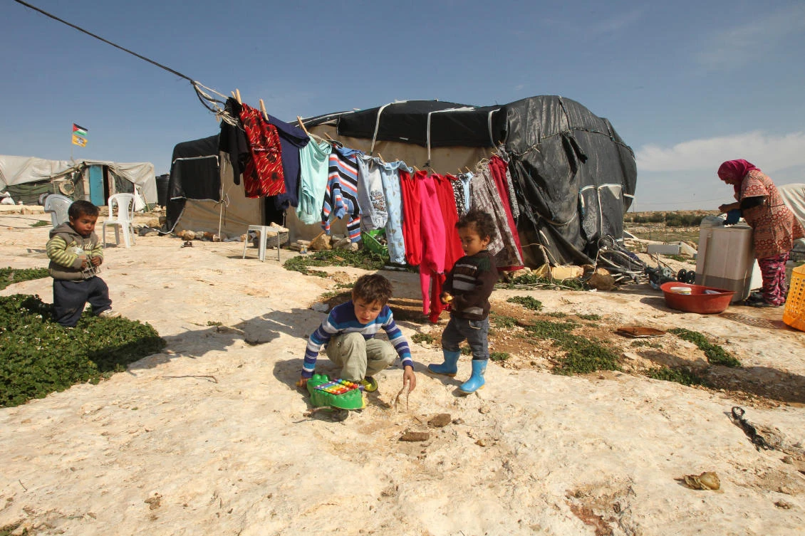 Australia allocated A$43 million for humanitarian assistance in the region for the current fiscal year, which began on July 1. Above, children play in the Palestinian village of Susya, southeast of Hebron in the Israeli-occupied West Bank in this 2016 photo. (AFP)