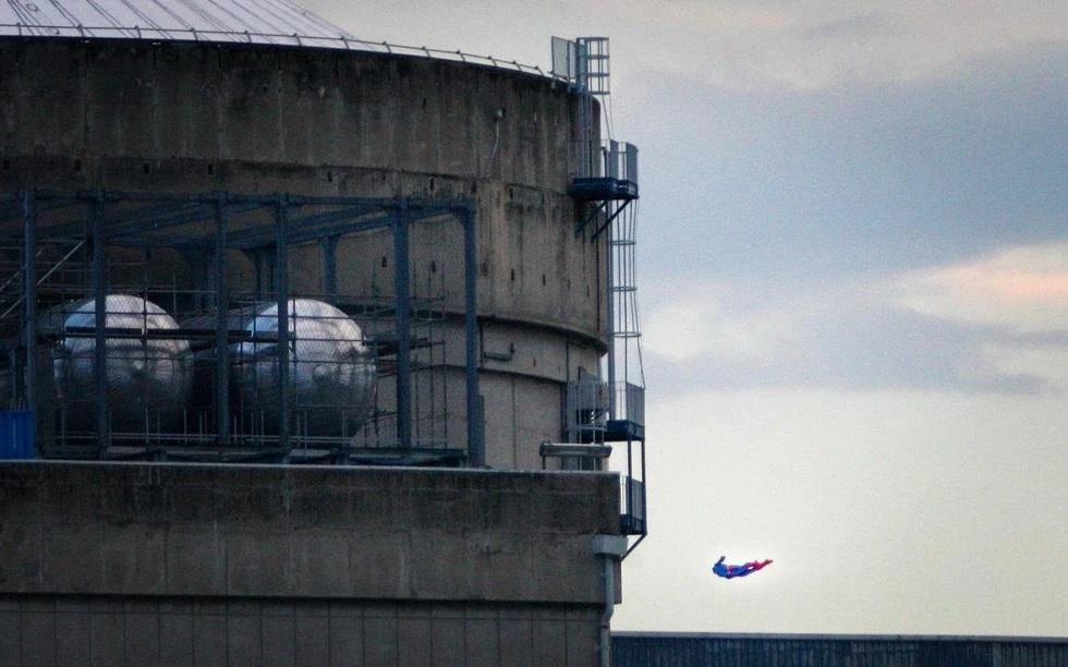 Above, a frame grab from a Greenpeace video shows a Superman-shaped drone abut to crash into a structure in EDF’s Bugey nuclear plant, near Lyon in France. (Courtesy Greenpeace)