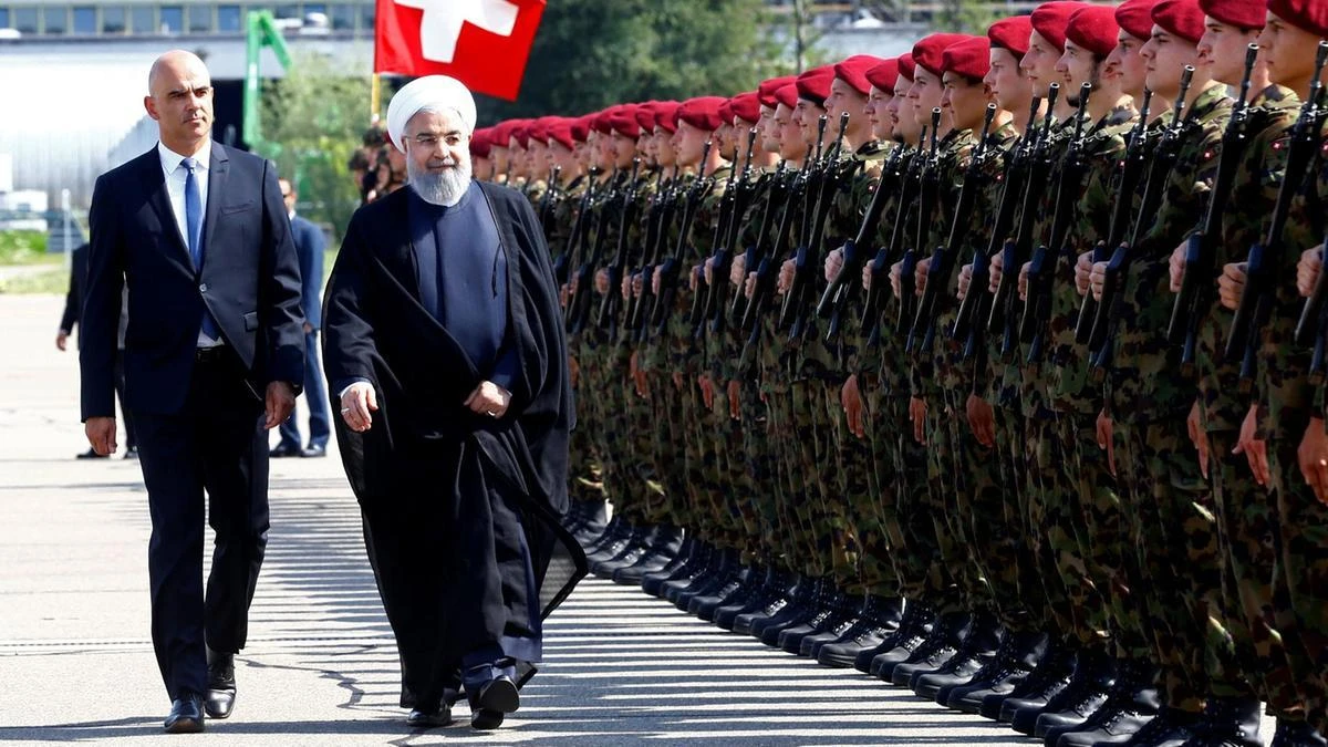 Tehran has called the arrests a 'false flag ploy' because of its timing as Iran president Hassan Rouhani, pictured with Swiss president Alain Berset, tours Europe. (Reuters)