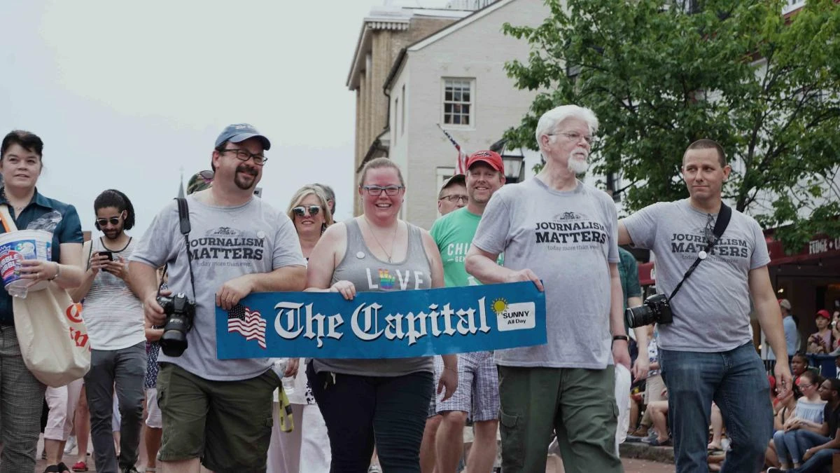 Current and former Capital Gazette staff members march in the Annapolis 4th of July parade in Annapolis, Md., Wednesday, July 4, 2018. (AP)