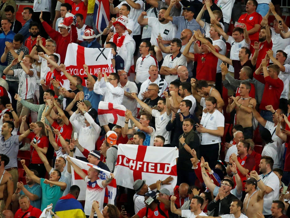 England fans celebrate after the match defeat of Colombia in the Round of 16 in the 2018 World Cup in Russia. (REUTERS/Christian Hartmann/File Photo)