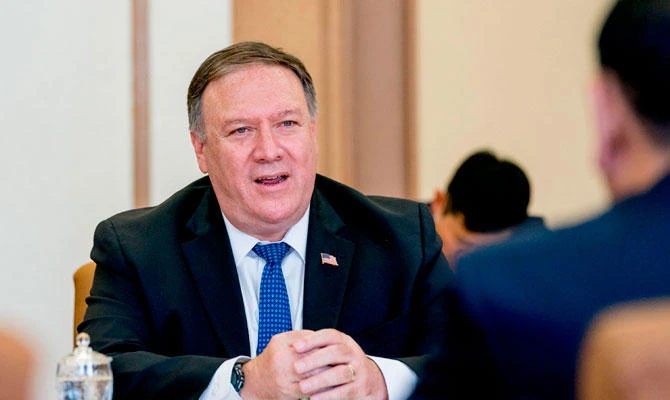 US Secretary of State Mike Pompeo (L) speaks during a meeting with North Korea's director of the United Front Department, Kim Yong Chol (R-back to camera) at the Park Hwa Guest House in Pyongyang on July 6, 2018. (AFP)
