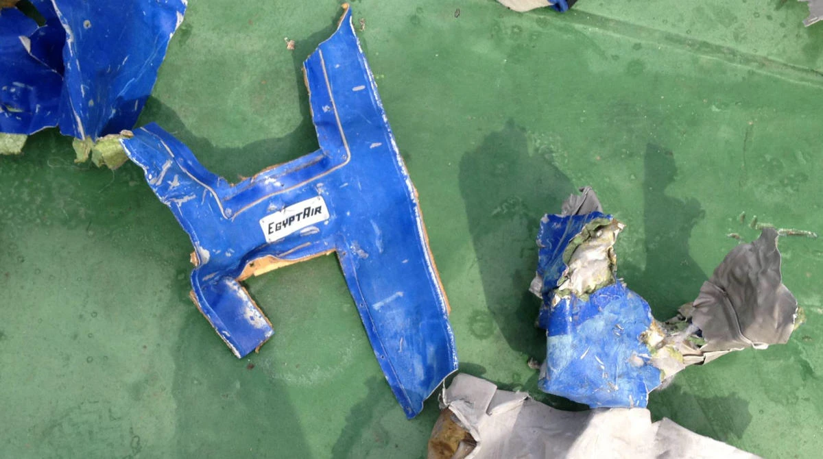 A picture uploaded on the official Facebook page of the Egyptian military spokesperson on May 21, 2016 reportedly shows some debris that the search teams found in the sea after the EgyptAir Airbus A320 crashed in the Mediterranean. (AFP)
