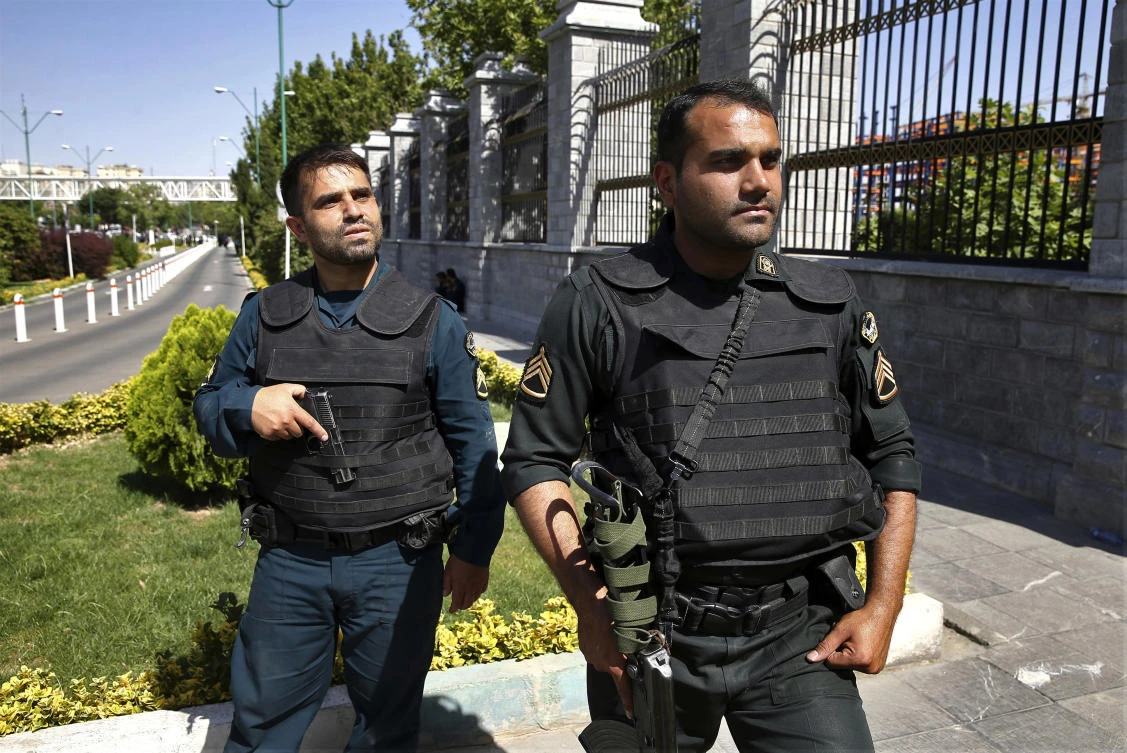 Iran said Saturday, July 7, 2018, it executed eight people convicted in the 2017 Islamic State group attack on parliament and the shrine of Ayatollah Ruhollah Khomeini in Tehran. (AP Photo/Ebrahim Noroozi, File)