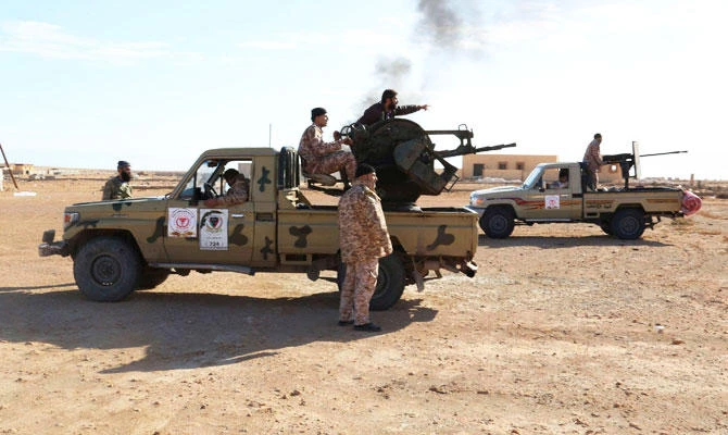 Libyan Army Forces belonging to Libya's rival government are seen on the outskirts of Al Sidra oil port, in this December 14, 2014 file photo. (REUTERS)