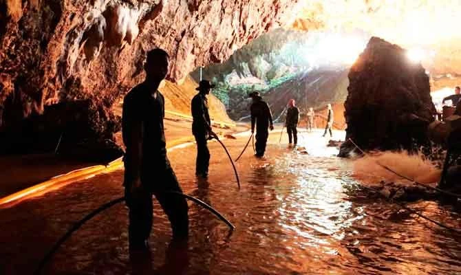 This undated handout photo taken recently and released by the Royal Thai Navy on July 7, 2018 shows Thai Navy soldiers in the flooded Tham Luang cave during rescue operations for the 12 boys and their football team coach trapped in the cave at Khun Nam Nang Non Forest Park in the Mae Sai district of Chiang Rai province. (AFP)