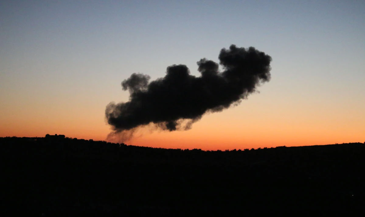 Smoke rises above rebel-held areas of the city of Daraa during reported airstrikes by Syrian regime forces on Sunday, July 8. The regime bombardment campaign on rebel-held areas in Daraa since June 19 had killed more than 160 civilians and displaced tens of thousands of people. (AFP)