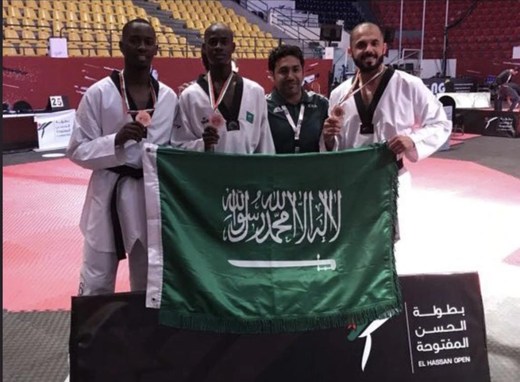 Abdullah Al-Zaaki, Hamad Mabrouk and Majed Mabrouk celebrate their medal success. (@AlShababSaudiFC)