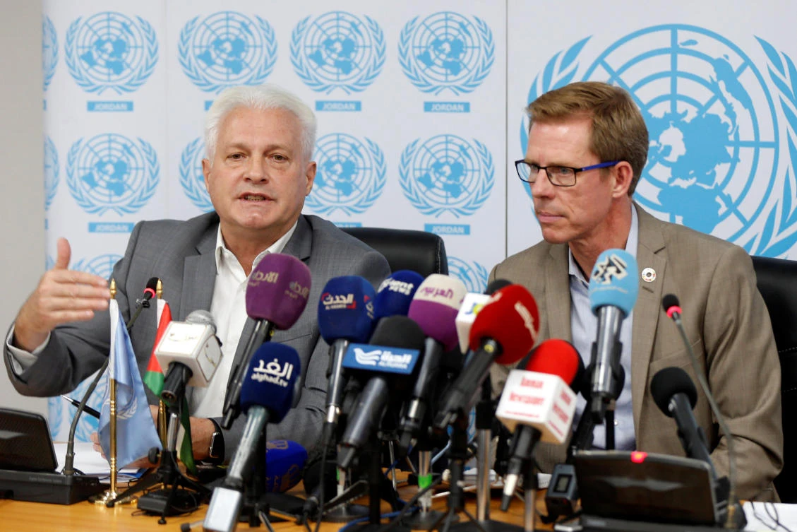 UN Resident and Humanitarian Coordinator in Jordan Anders Pedersen (R) and UNHCR Representative in Jordan Stefano Severe, speak during their news conference in Amman, Jordan, July 8, 2018. (Reuters)