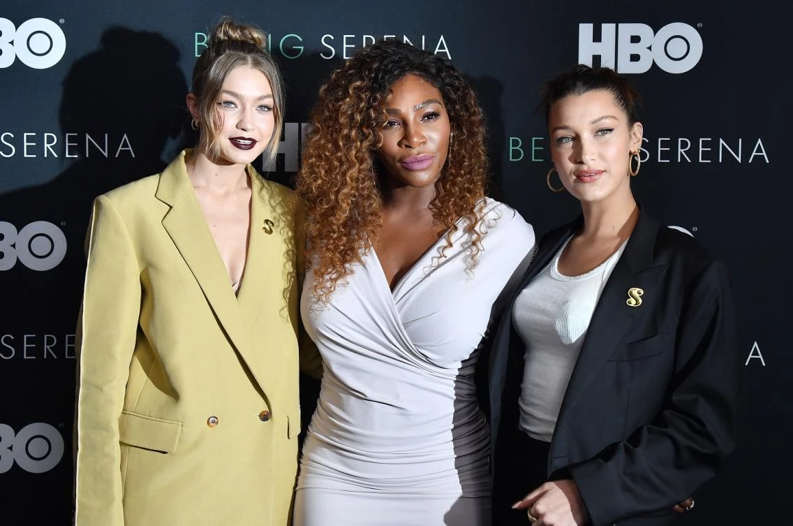 Gigi Hadid (R) shed light on her relationship with her younger sister in an interview with Serena Williams (center). (File photo: AFP)