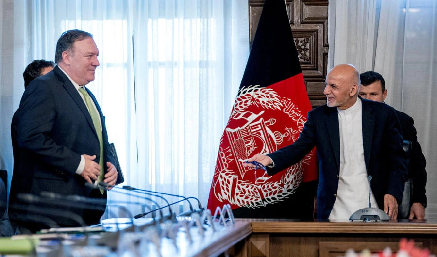 US Secretary of State Mike Pompeo and Afghan President Ashraf Ghani arrive for a meeting at the Gul Khanna in the Presidential Palace in Kabul, Afghanistan, on July 9, 2018. (Andrew Harnik/Pool via Reuters)