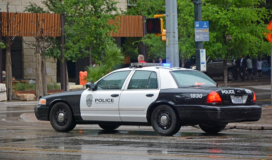Mom says Texas cop choked boy before aiming gun at kids