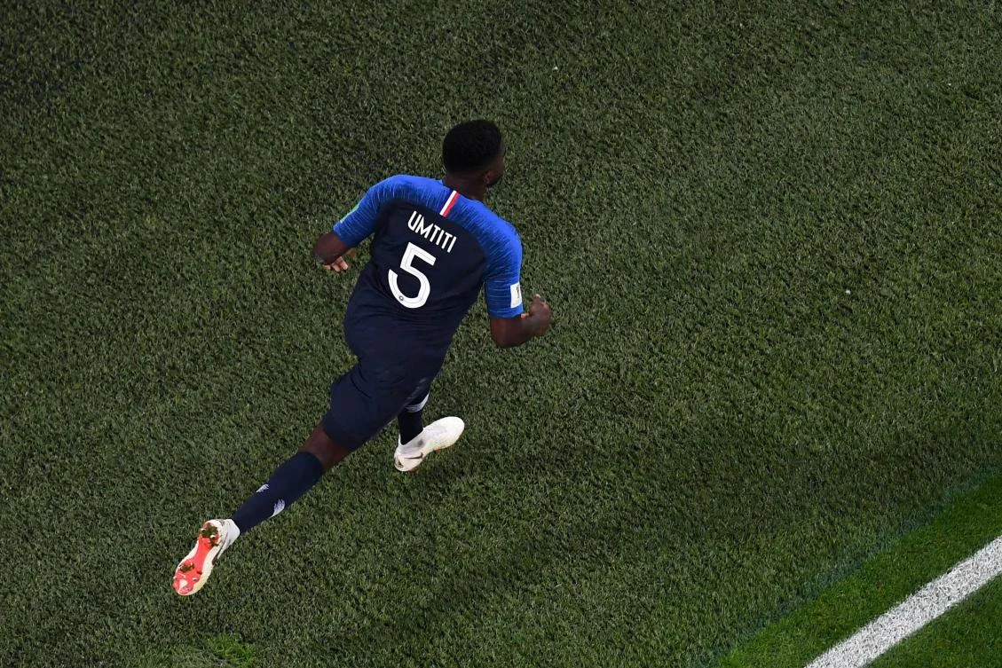 France's defender Samuel Umtiti celebrates after scoring a goal during the Russia 2018 World Cup semifinal football match between France and Belgium. (AFP/Jewel SAMAD)
