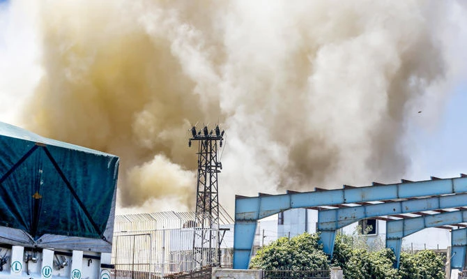 Smoke rises in the aftermath of the regime forces' demolition of a tunnel used by the opposition in Damascus' northeastern suburb of Qaboun. AFP