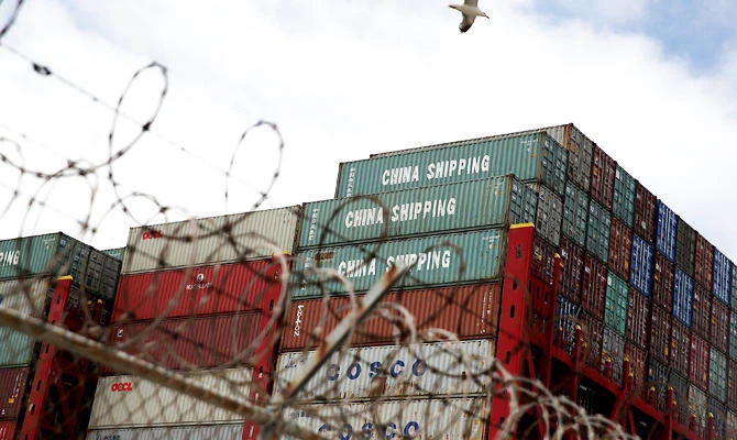 In this file photo taken on June 20, 2018, shipping containers sit on the the Hong Kong based CSCL East China Sea container ship at the Port of Oakland on June 20, 2018 in Oakland, California. (AFP)