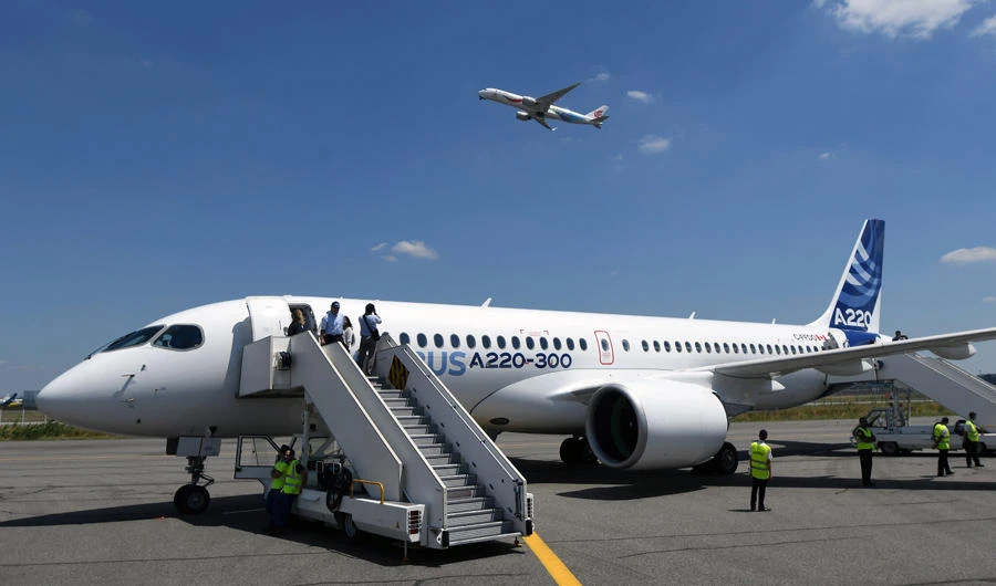 This photo taken on July 10, 2018 shows the new Airbus A220-300 parked on the tarmac on July 10, 2018 at the Airbus delivery center, in Colomiers southwestern France. (AFP / PASCAL PAVANI)