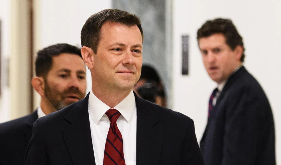 In this file photo taken on June 27, 2018 FBI agent Peter P. Strzok (C) arrives for a full committee meeting on "Deposition of Peter P. Strzok "at the House Judiciary Committee on Capitol Hill in Washington, DC. Like any caring lover, Peter Strzok was there with reassurances when girlfriend Lisa Page confessed deep fears about the future under a Donald Trump presidency in a late-night text message in August 2016. (AFP / Mandel Ngan)