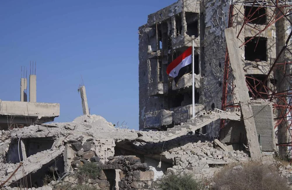 Syria army raises flag in Daraa, cradle of revolt