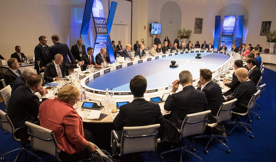 NATO insists it is united at  end of raucous, divisive summit