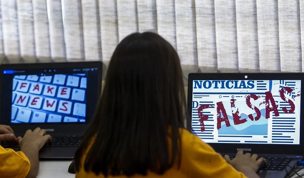 Students of Unified Educational Centers (CEU) attend a lesson on 'Fake News: access, security and veracity of information', in Sao Paulo, Brazil on June 21, 2018. (AFP)