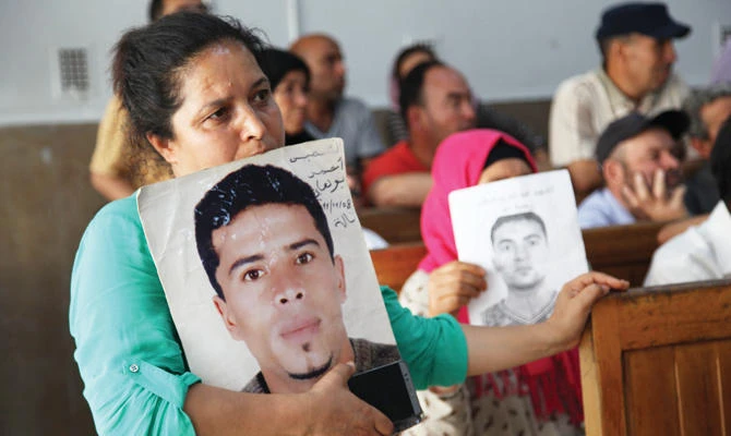 Families of victims mourn their relatives in the Tunisian city of Kasserine. AFP