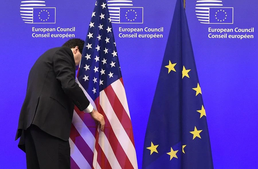 The United States flag and the European Union flag. (AFP)