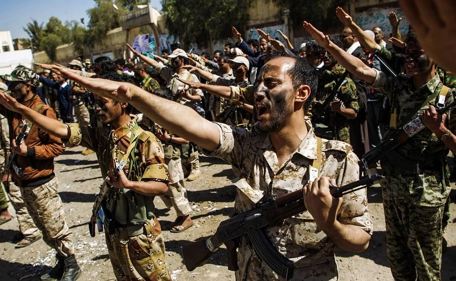 Newly recruited Houthi militants chant slogans during a gathering in the capital Sanaa to mobilize more fighters to battlefronts to fight pro-government forces in several Yemeni cities. (File Photo: AFP/Mohammed Huwais)