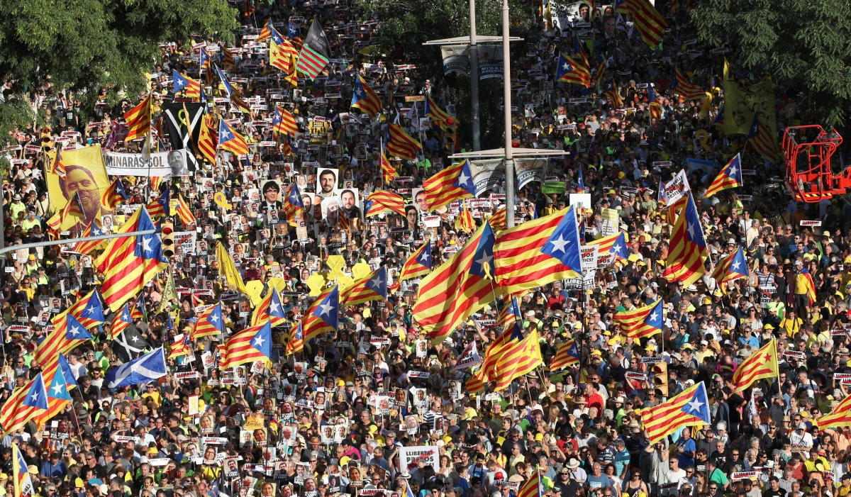 People hold banners during a protest against the imprisonment of the Catalan separatist leaders, in Barcelona, Spain, July 14, 2018. (Reuters)