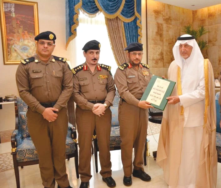 Makkah Gov. Prince Khaled Al-Faisal receives Maj. Gen. Al-Matrafi, director of the General Directorate of Civil Defense, in Makkah on Saturday. (SPA)