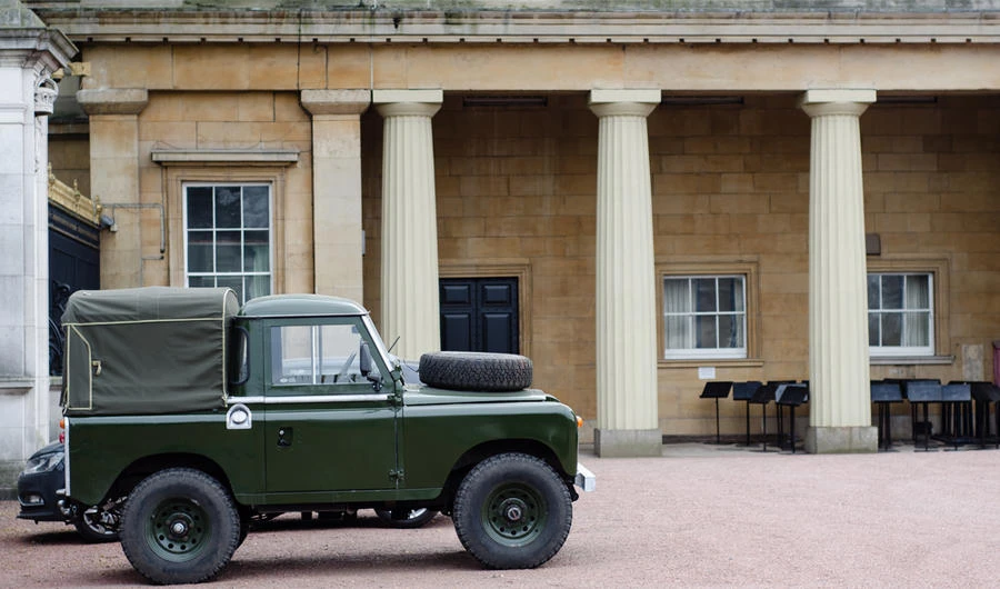 Land Rover Defender in the grounds of Buckingham Palace. (Shutterstock photo)